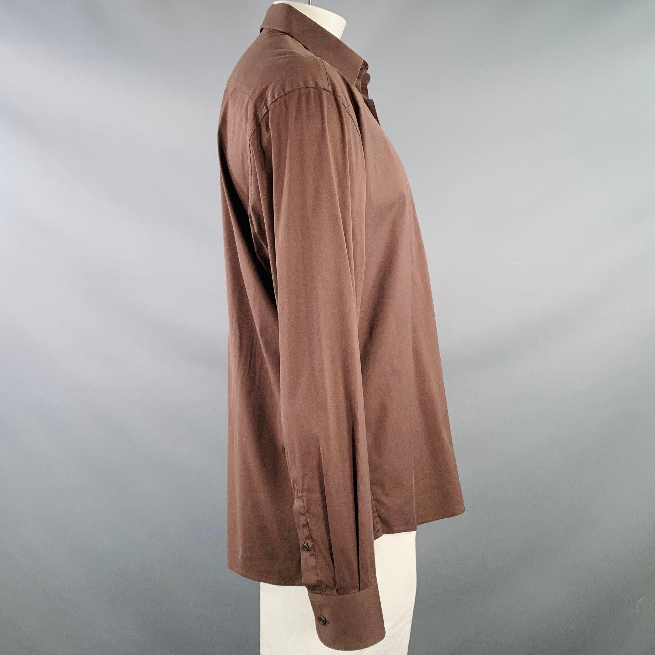 PRADA long sleeve shirt
in a brown cotton blend fabric featuring a spread collar, and button closure. Made in Italy.Excellent Pre-Owned Condition. 

Marked:   44/17.5 

Measurements: 
 
Shoulder: 21 inches Chest: 49 inches Sleeve: 27 inches Length:
