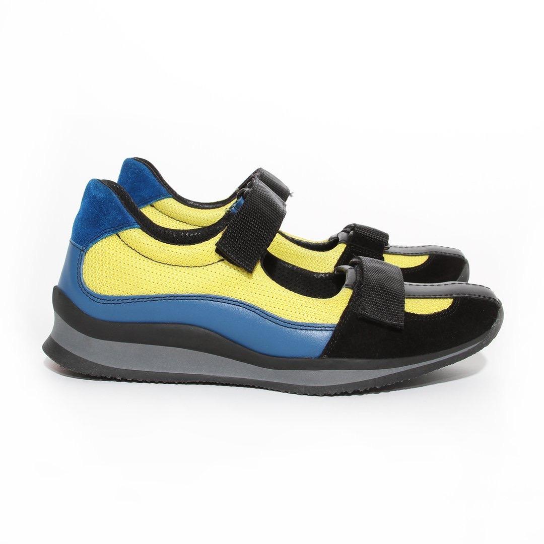 Prada slip-on sneaker
Two velcro strips
Bright yellow mesh
Blue leather
Blue suede on back of heel
Black and grey sole 
Square shaped toe
Condition; Excellent condition. Like new. 
Size/Measurements: 
Size 38.5