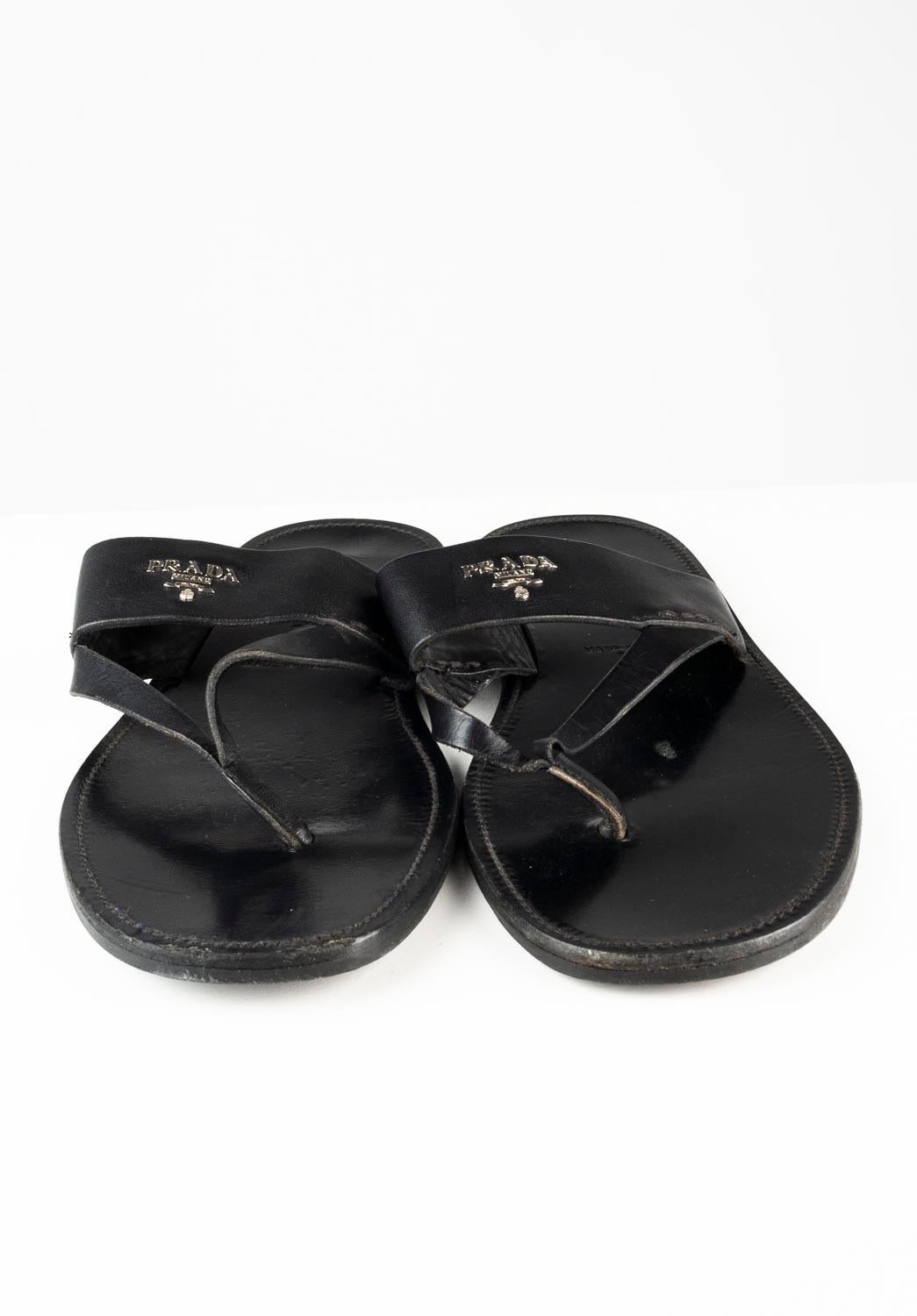 100% genuine Prada Men Leather Sandals with dust bag, S614 
Color: black
(An actual color may a bit vary due to individual computer screen interpretation)
Material: leather
Tag size: UK7, USA8, EUR41
These shoes are great quality item. Rate 8,5 of