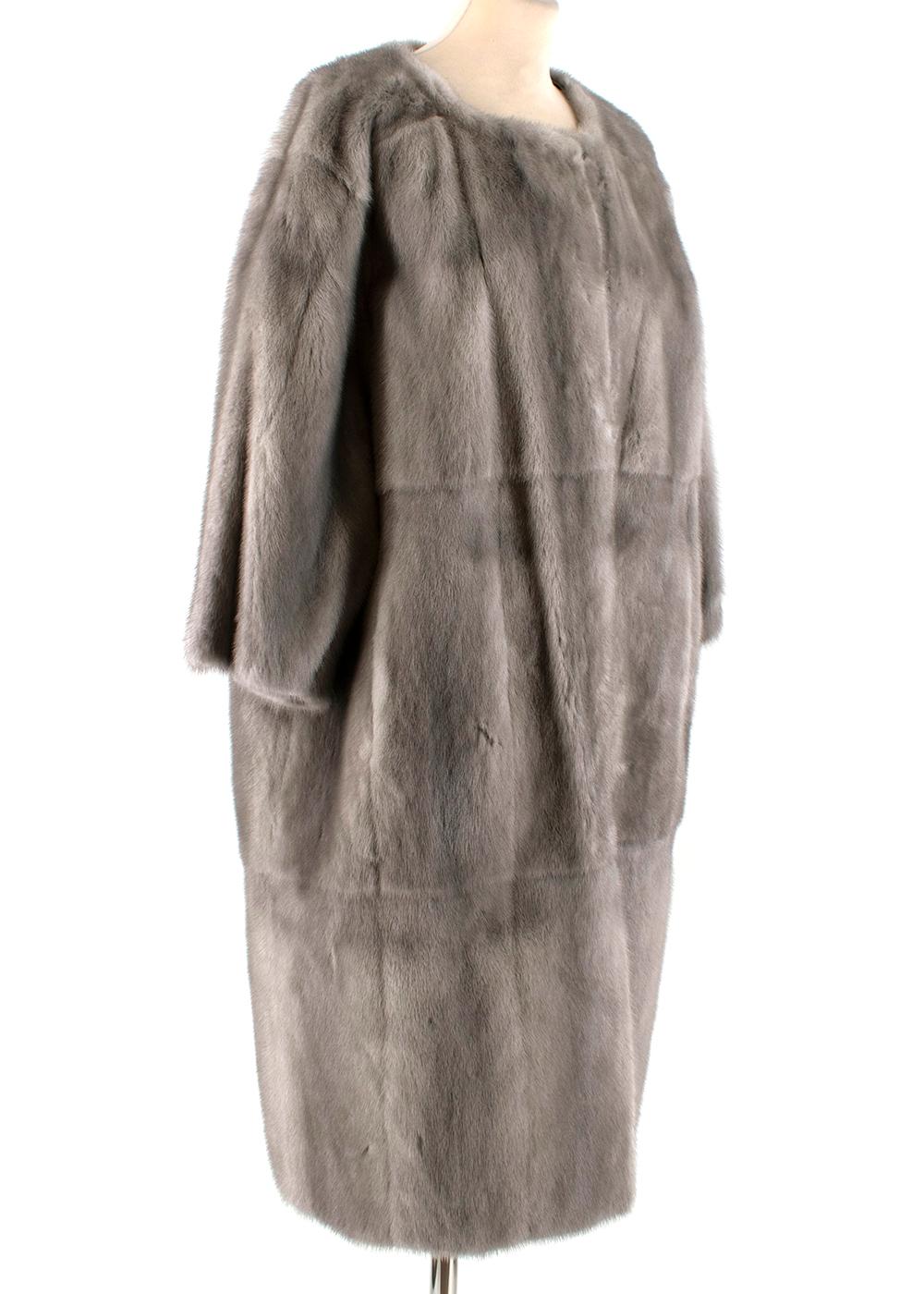 Prada Grey Mink Coat

-Luxurious soft fur texture
-Neutral medium grey hue 
-Timeless classic cut
-Round neckline 
-Hook fastening to the front 
-pockets to the front  
-Elegant, easy to style coat
-One of those pieces that if treated kindly will