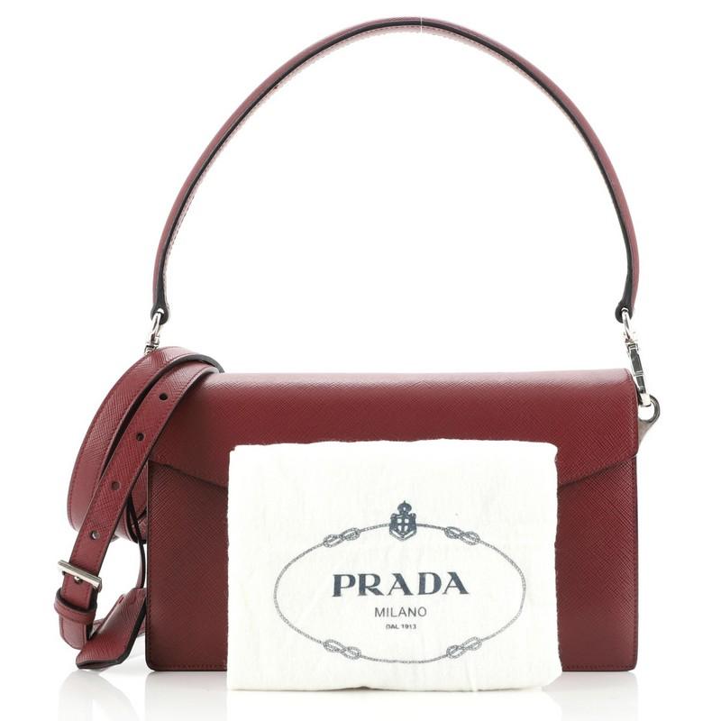 Condition: Good. Wear on base corners, creasing on exterior, fraying and splitting on strap base wax edges, wear and darkening on clochette. Heavy splitting on clochette wax edges. Scuffs, indentations and wear underneath flap and in interior,