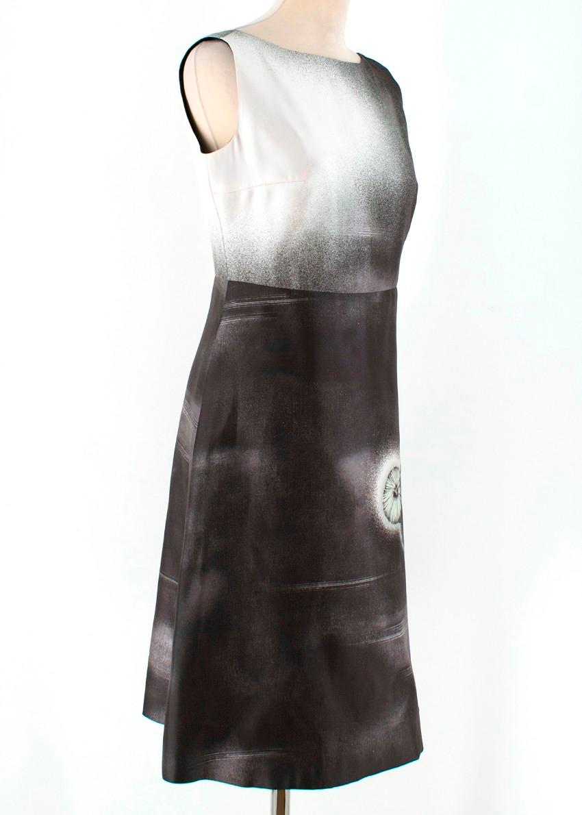 Prada Special Edition Black and White Printed Silk Dress

-Black and white printed dress
-Features dandelion head print
-Low back
-Tailored around the bust and waist
-Back zip closure
-Knee length

Please note, these items are pre-owned and may show