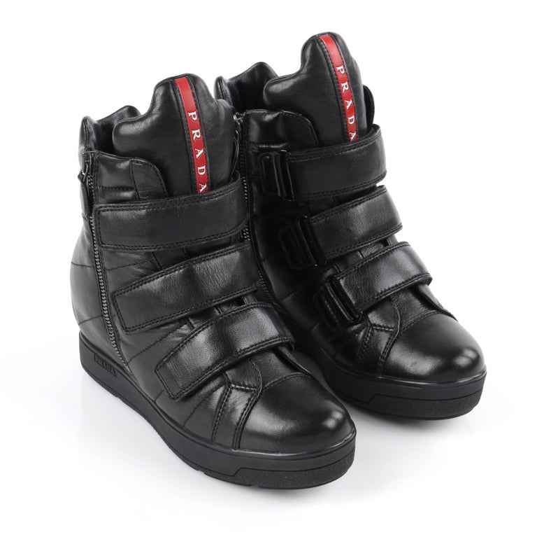 PRADA Sport A/W 2013 Black Vitello Leather Triple Strap Hi Top Wedge  Sneakers at 1stDibs | prada wedge sneakers, prada sneakers