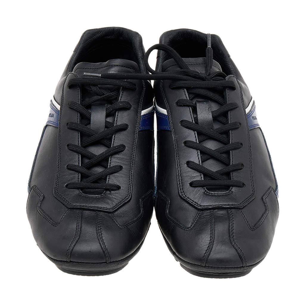 Coming in a classic low-top silhouette, these Prada Sport sneakers are a seamless combination of luxury, comfort, and style. They are made from leather in dual shades. These sneakers are designed with logo details, laced-up vamps, and comfortable