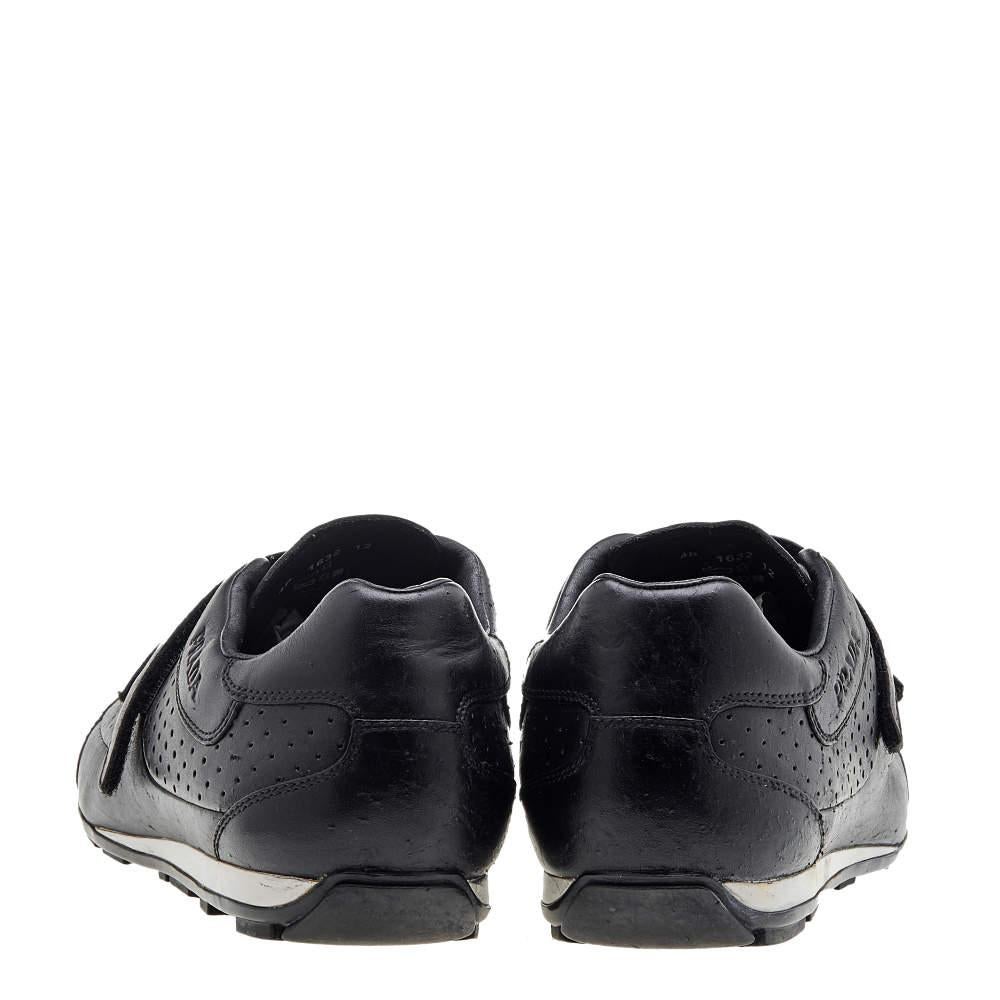 Coming in a classic low-top silhouette, these Prada Sport sneakers are a seamless combination of luxury, comfort, and style. They are made from leather in a black shade. These sneakers are designed with logo details, velcro vamps, and comfortable