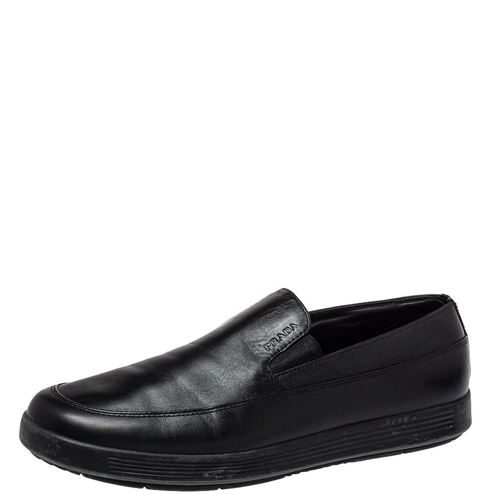 Stylish and super comfortable, this pair of loafers by Prada Sport will make a great addition to your shoe collection. They have been crafted from leather and styled with round toes and embossed logo details on the vamps. Leather insoles and rubber