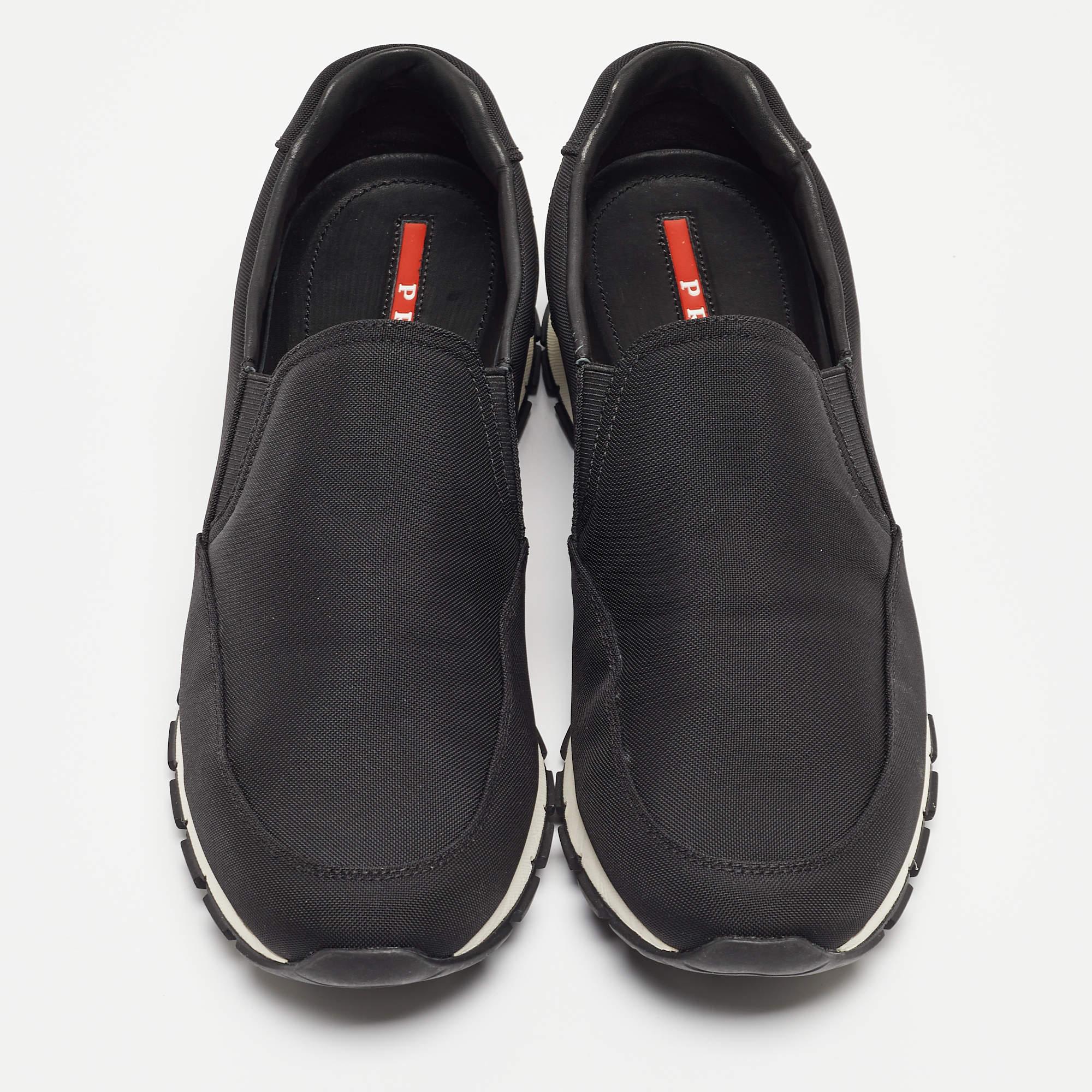 Give your outfit a luxe update with this pair of Prada black sneakers. The creation is sewn perfectly to help you make a statement in them for a long time.

Includes
Original Dustbag