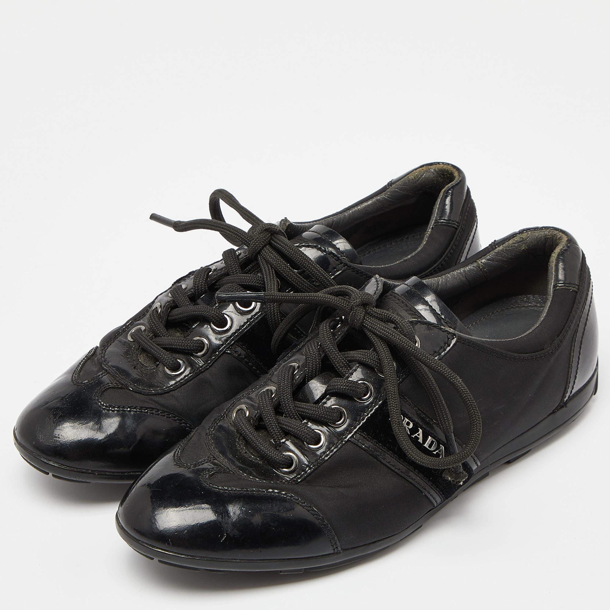 Coming in a classic silhouette these designer sneakers are a seamless combination of luxury comfort and style. These sneakers are finished with signature details and comfortable insoles.