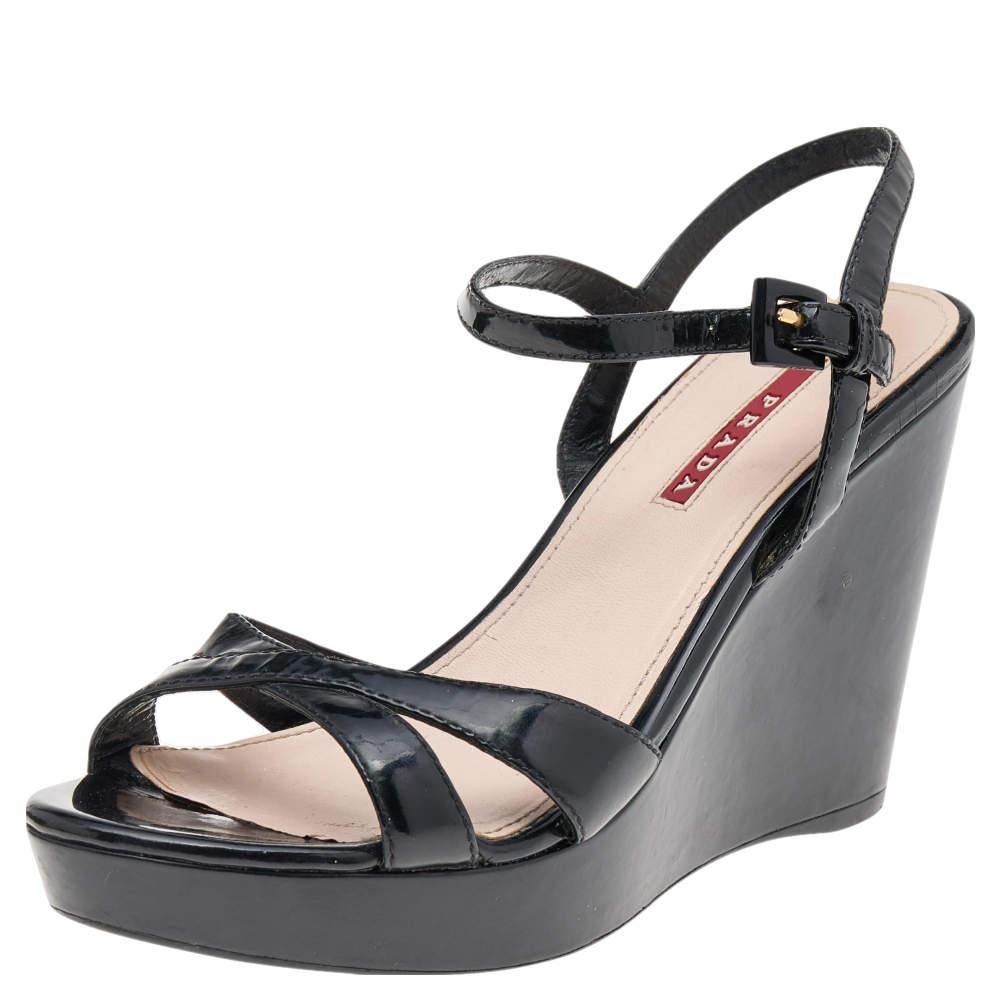 Every woman knows that wedges, no matter how high, are pretty easy to walk in. These Prada Sport ones are the same, but with more elegance and style. They've been designed with open toes, ankle fastenings, and high wedges. Well-built and gorgeous,
