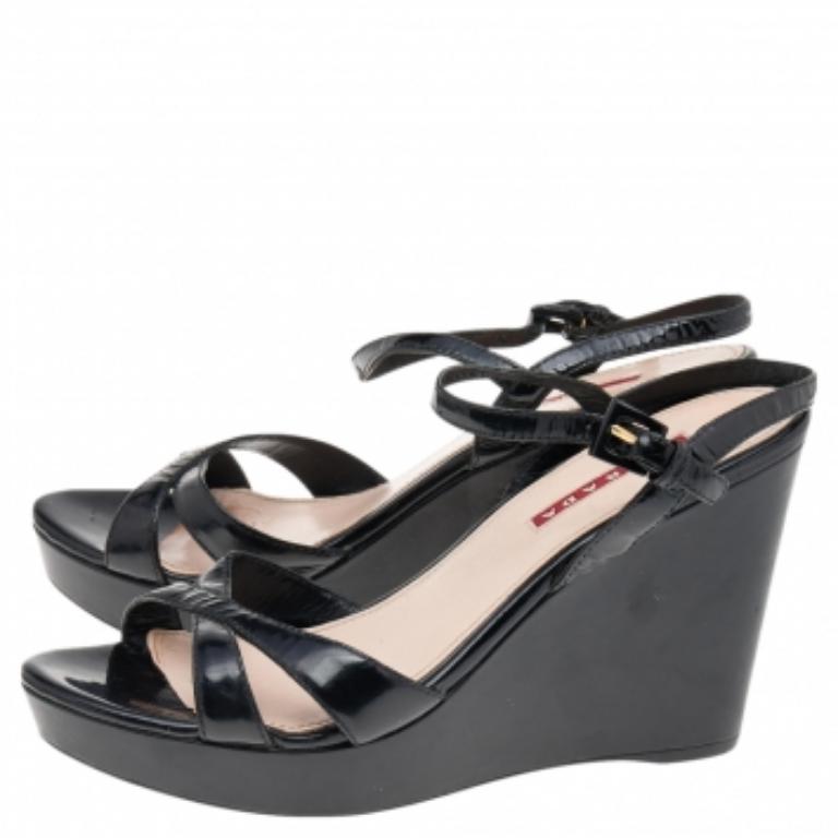 Every woman knows that wedges, no matter how high, are pretty easy to walk in. These Prada Sport ones are the same, but with more elegance and style. They've been designed with open toes, ankle fastenings, and high wedges. Well-built and gorgeous,