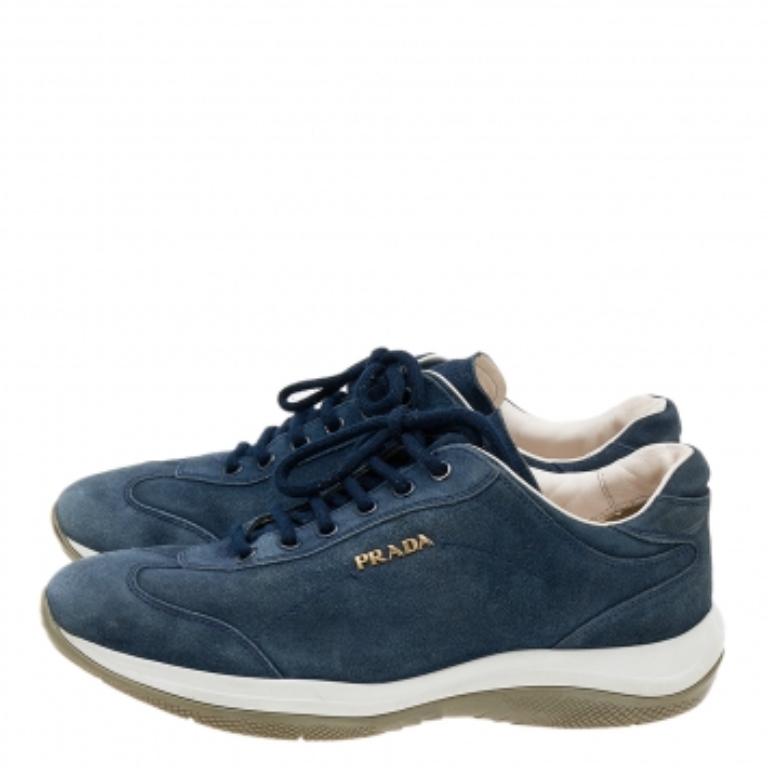A pair that will see you through a long day in full comfort! Crafted using suede, these Prada Sport sneakers are designed in a low-top style, secured with lace-ups, and set atop durable rubber soles.