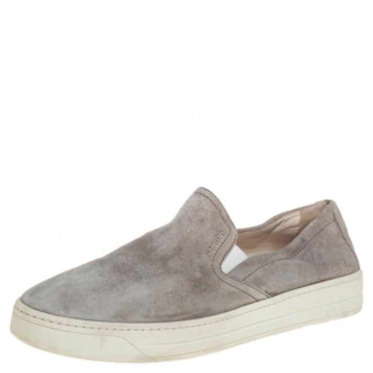 Step out in style and confidence as you wear these smart grey sneakers. Look your stylish best every time you step out wearing these trendy suede sneakers, designed with round toes, an slip-on silhouette, and sturdy soles. Flaunt a stylish look
