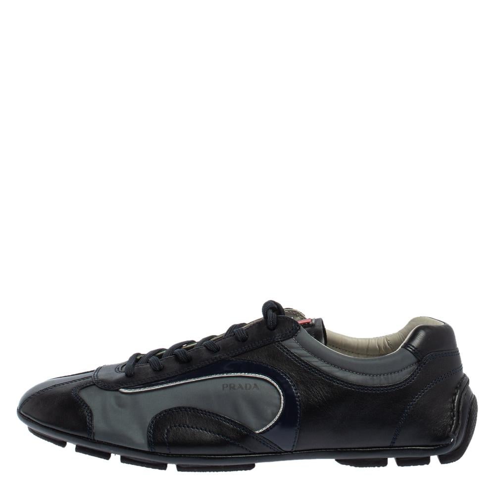 Made to provide high style, these sneakers by Prada Sport are trendy and stylish. They've been crafted from leather and nylon and designed in a navy blue hue. Wear them with your casual outfits for a sporty look dipped in luxury.

