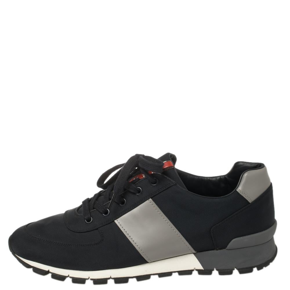 Project a stylish look every time you step out in these Match Race sneakers from Prada Sport. They are crafted from fabric and leather and styled with lace-ups on the vamps and brand logo details on the tongues and the counters. They are equipped