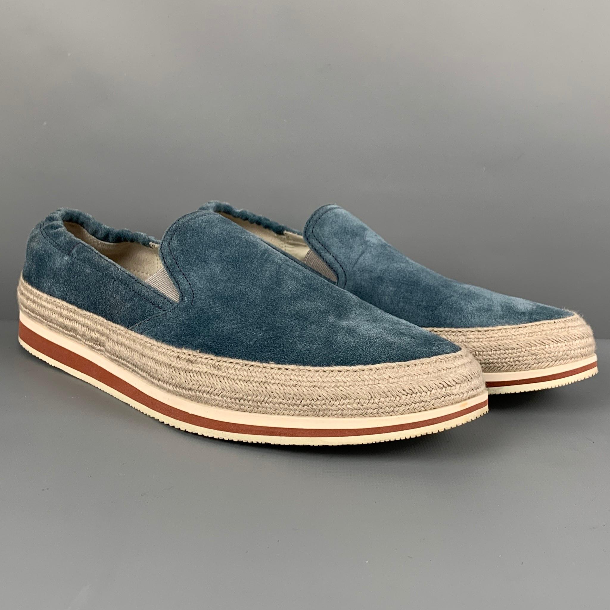 PRADA SPORT loafers comes in a blue & grey two toned suede featuring a slip on style, rope trim, and a rubber sole. 

Very Good Pre-Owned Condition.
Marked: 4D 2363 8

Outsole: 12 in. x 4 in. 