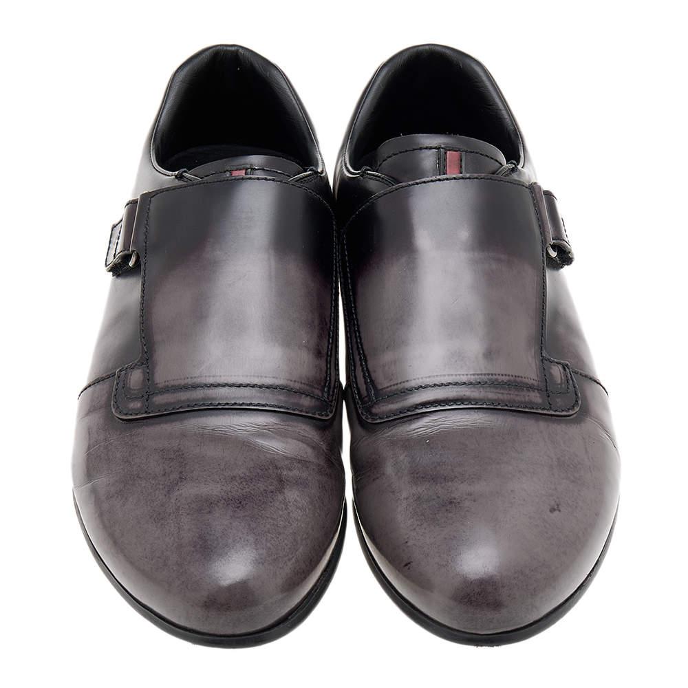 Take your shoe game a notch higher with these wonderful shoes from Prada Sport. The two-tone shoes are crafted from leather and feature a single strap monk detail. They are completed with rubber soles.

