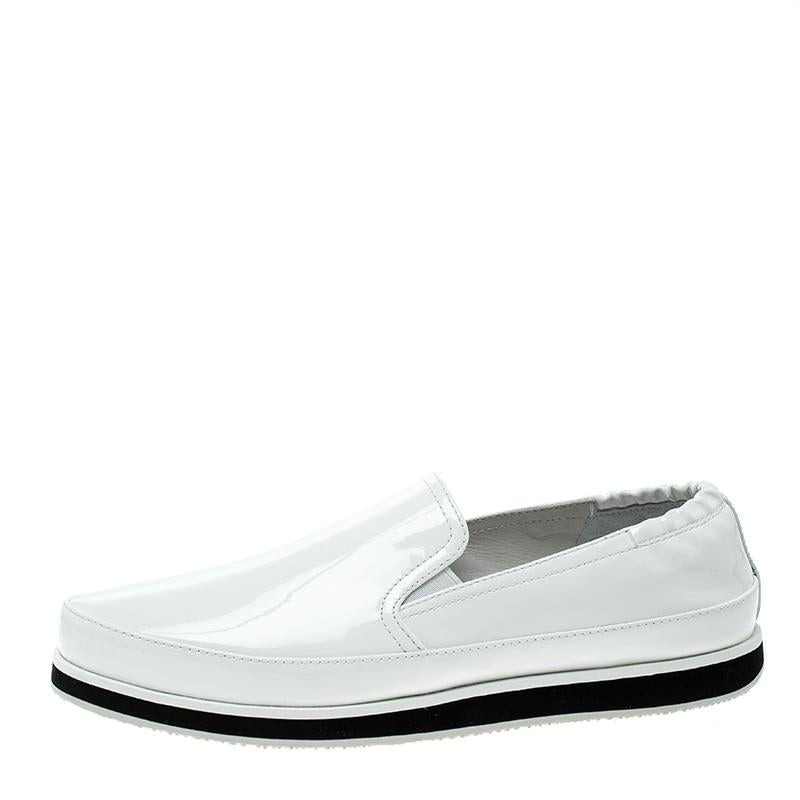 A pair of scrunch sneakers like this Prada pair is a perfect companion for travelling. Crafted from a white patent leather body, this pair comes with an elasticated rear and side panels that makes it easy to slip on and off. It is detailed with
