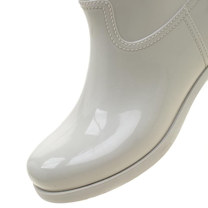 white rubber rain boots