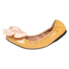 Prada - Chaussures de ballet de sport en cuir beige avec nœud papillon, taille 38,5