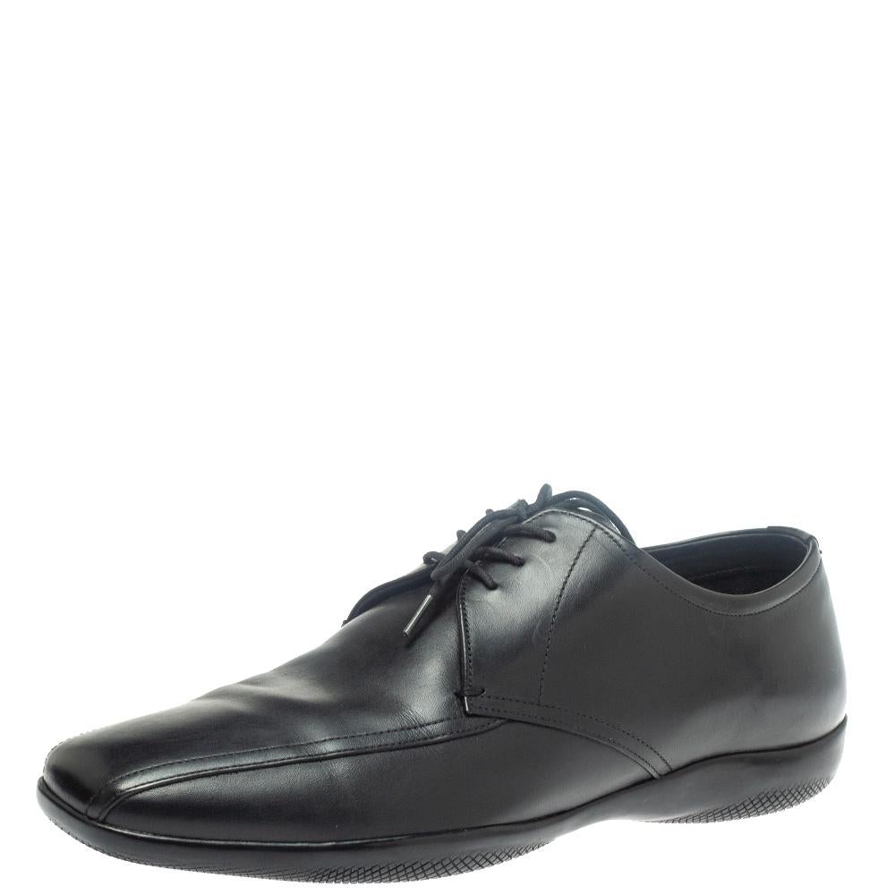 These classic and timeless derbies by Prada fit perfectly in your formal closet. Crafted from black leather, these shoes feature stitch detailing and lace-up fronts. These smart shoes have a leather-lined interior to give a feel of luxury to your