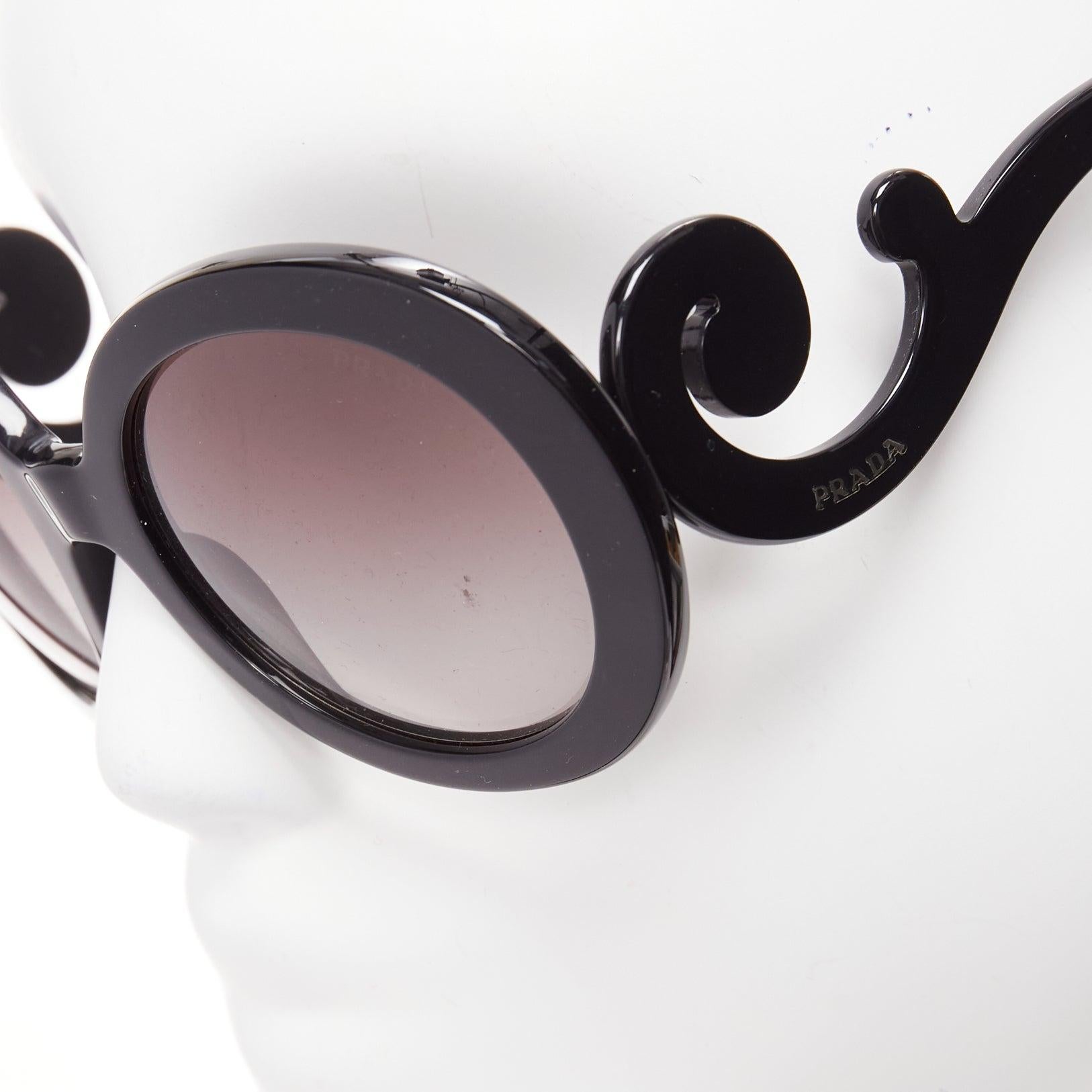 PRADA SPR27N black swirl temple logo round oversized sunglasses
Reference: AAWC/A01020
Brand: Prada
Designer: Miuccia Prada
As seen on: Mary-kate Olsen
Material: Acetate
Color: Black
Pattern: Solid
Lining: Black Acetate
Extra Details: Logo at