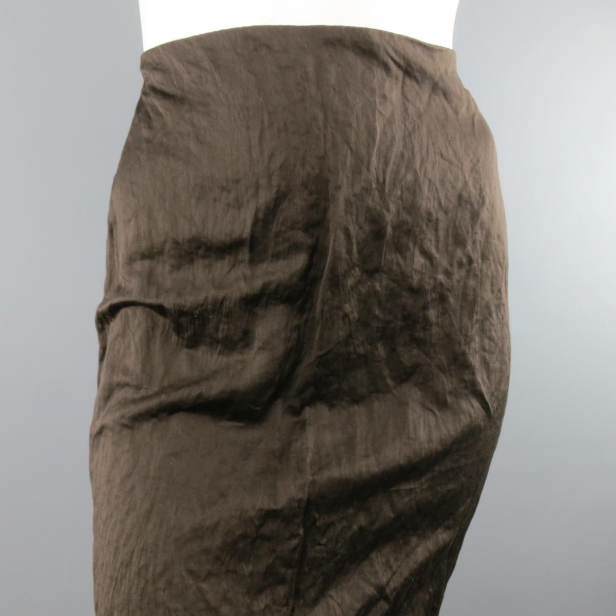 PRADA Spring/Summer 2009 Collection pencil skirt in a light weight, wrinkle textured brown cotton metal blend fabric. Matching jacket available separately. Made in Italy.

Excellent Pre-Owned Condition.
Marked: IT 44

Measurements:

Waist: 30