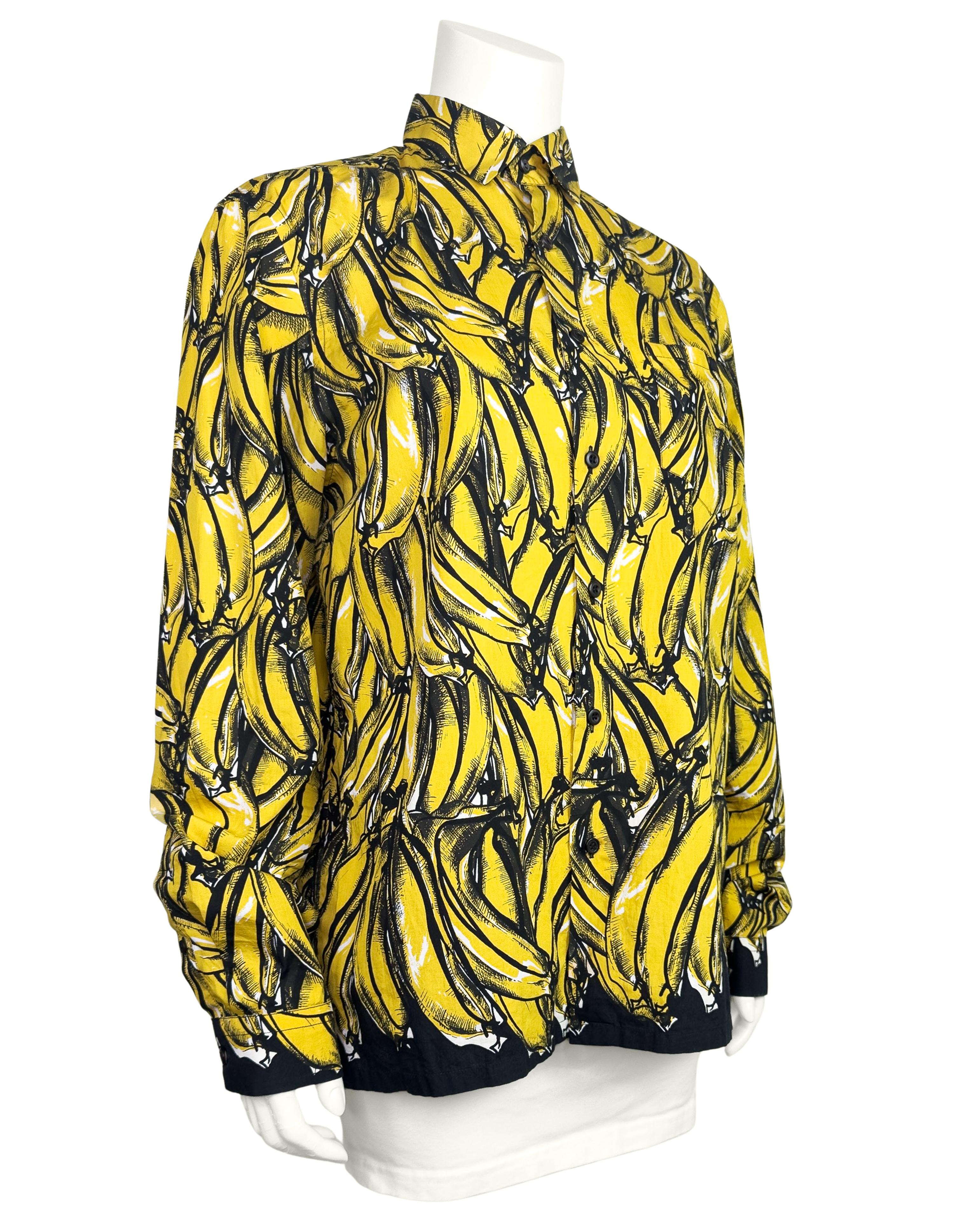 Prada by Miuccia Prada Banana Print button up shirt from the spring 2011 'minimal baroque' collection. Featuring illustrated banana print, single pocket featuring logo tab at chest and button closures at front.

A bold and collectable piece from a