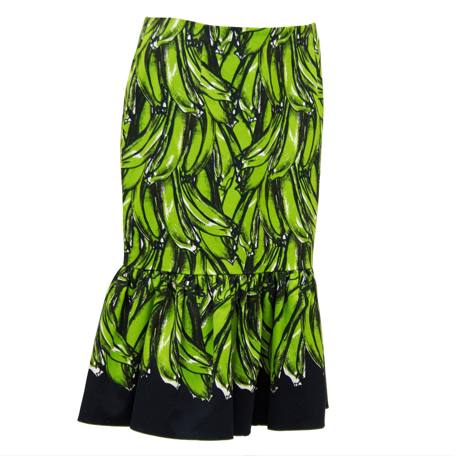 Featured on the runway for the Prada 2011 Spring RTW show and on the pages of fashion magazines and waists of the fashion elite, this cotton fluted pencil skirt is a iconic piece of fashion. Features an all over print of green bananas on a black