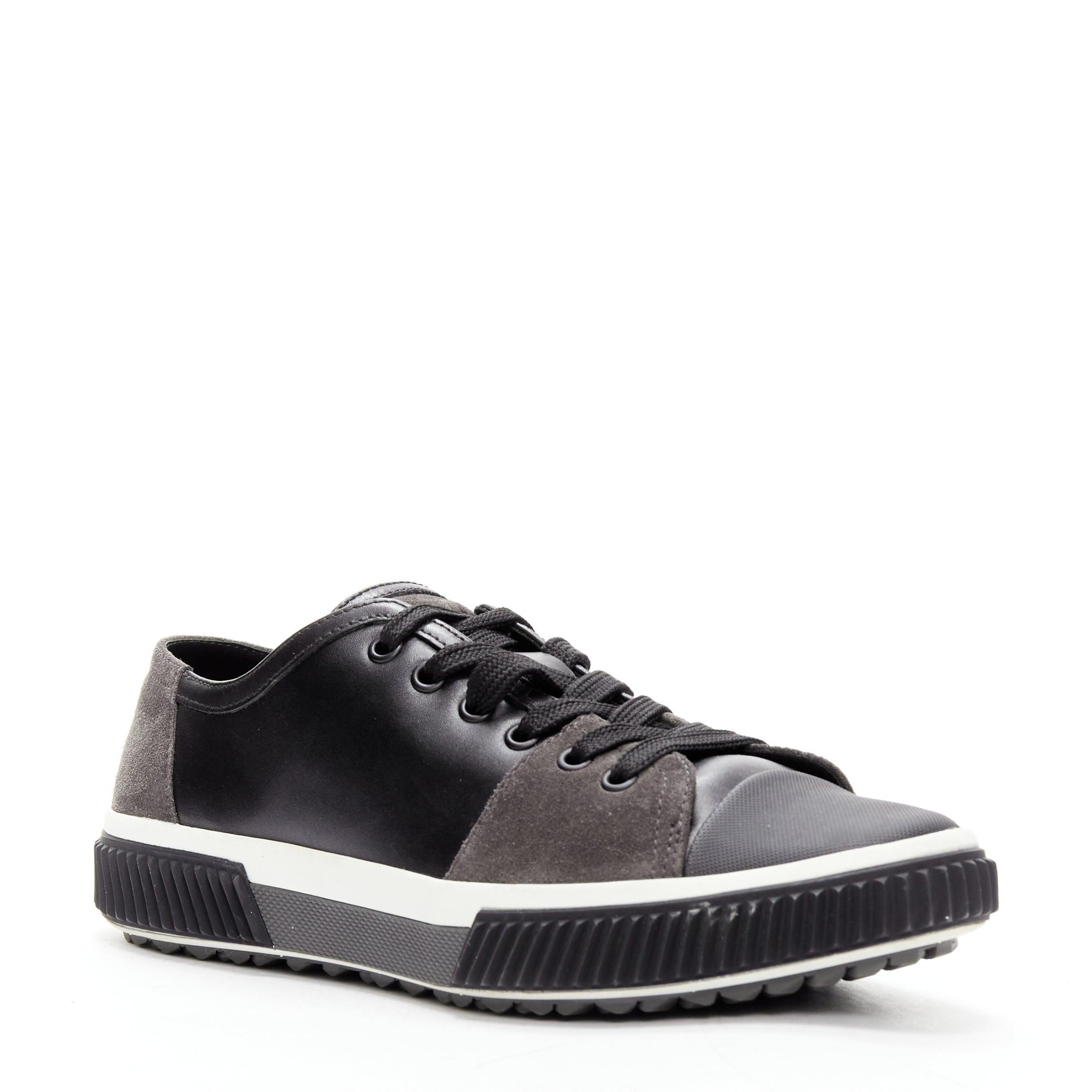 PRADA Stratus black grey suede leather low top sneakers UK5.5 EU39.5
Reference: CNLE/A00226
Brand: Prada
Model: Stratus
Material: Leather, Canvas
Color: Black, Grey
Pattern: Solid
Closure: Lace Up
Lining: Black Leather
Extra Details: MODEL: