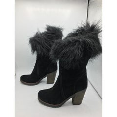 Bottes de neige en daim de Prada, noires