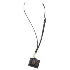 PRADA Symbole Triangle logo saffiano leather AirPods lanyard bag black red