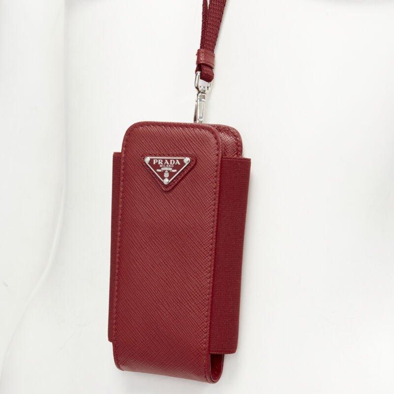 PRADA Symbole Triangle logo saffiano leather phone pouch lanyard bag red
Reference: TGAS/C01605
Brand: Prada
Designer: Miuccia Prada
Model: Phone pouch
Material: Leather, Nylon
Color: Red
Pattern: Solid
Closure: Elasticated
Extra Details: This will