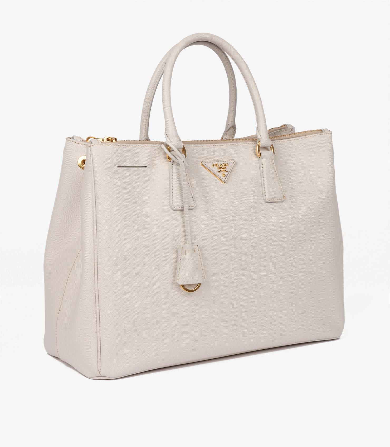 Prada Talco Saffiano Lux Leather Large Galleria Tote

Product Details
Xupes Ref: CB1274
Brand: Prada
Model: Large Galleria Tote
Type: Tote
Serial Number: 180
Age: 2011
RRP: £3,700
Accompanied By: Prada Dust Bag, Authenticity Card, Care Booklet,