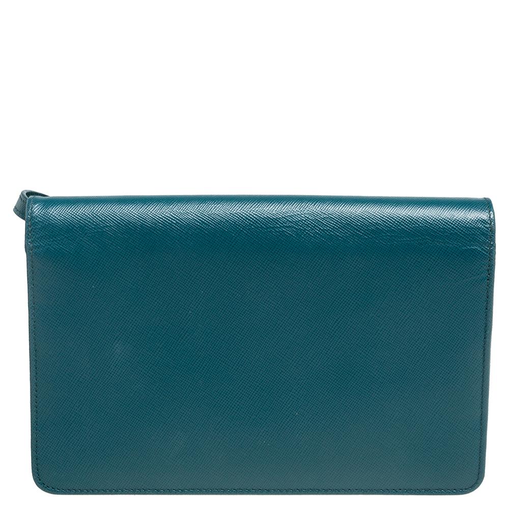 A structured and compact crossbody bag can assist you with many outings and can be styled with most of your attires. This Prada bag is an example of the label’s penchant for creating staple pieces. It is made from Saffiano leather in a teal blue