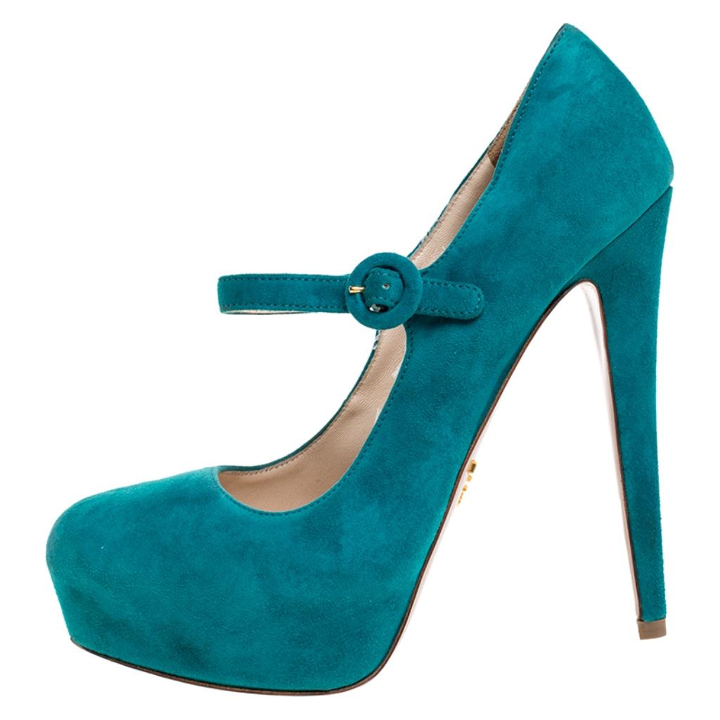 These stunning pumps by Prada will make sure you make a statement everywhere you go. Crafted in Italy, they are made of quality suede and come in a lovely shade of teal. They have been styled in a classic mary-jane style with a buckled strap. They