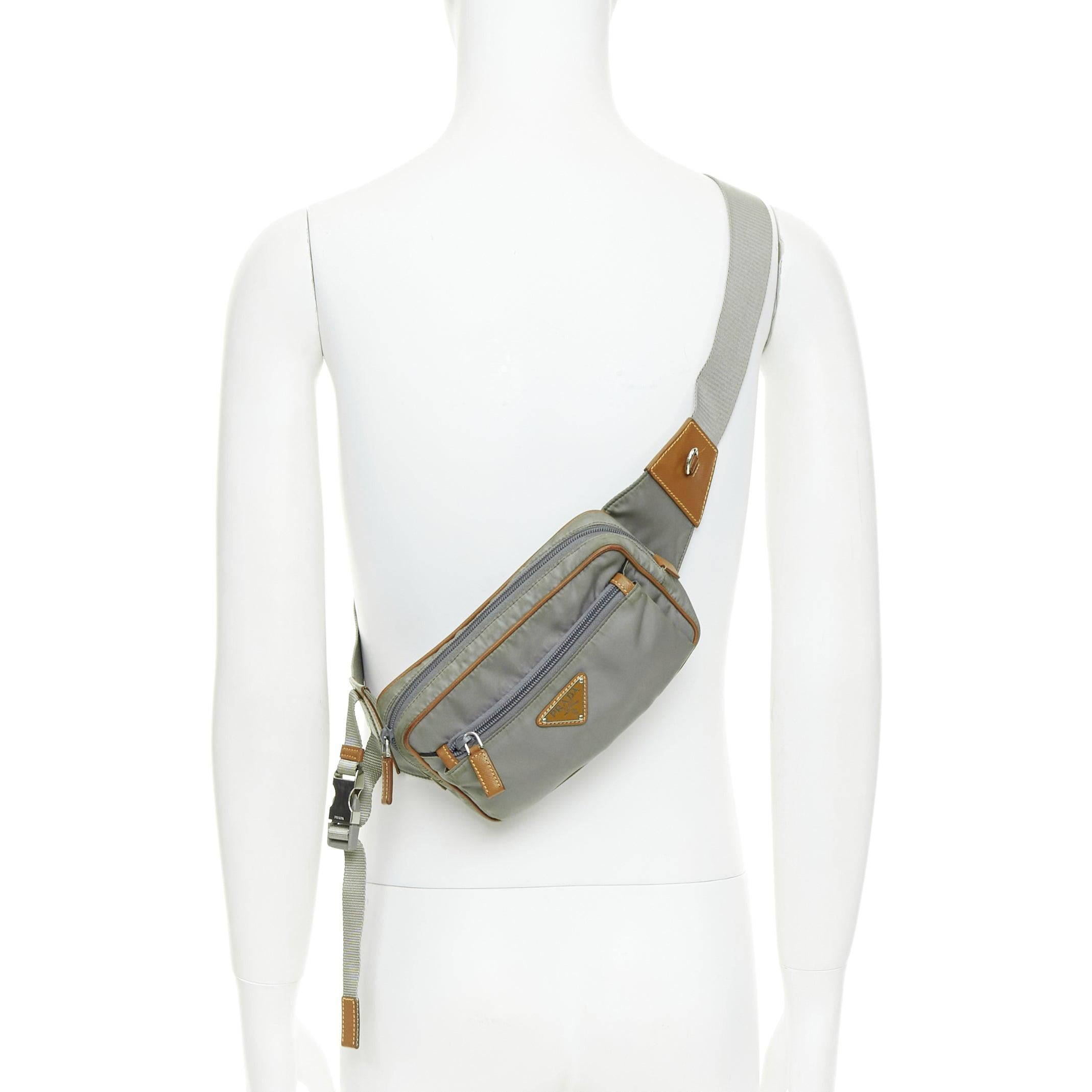 PRADA Sac à ceinture Tessuto Montagna en nylon gris et cuir marron avec logo
Référence : CNLE/A00436
Marque : Prada
Designer : Miuccia Prada
Modèle : Tessuto Montagna
MATERIAL : Nylon, cuir
Couleur : Gris, Marron
Motif : Solide
Fermeture :