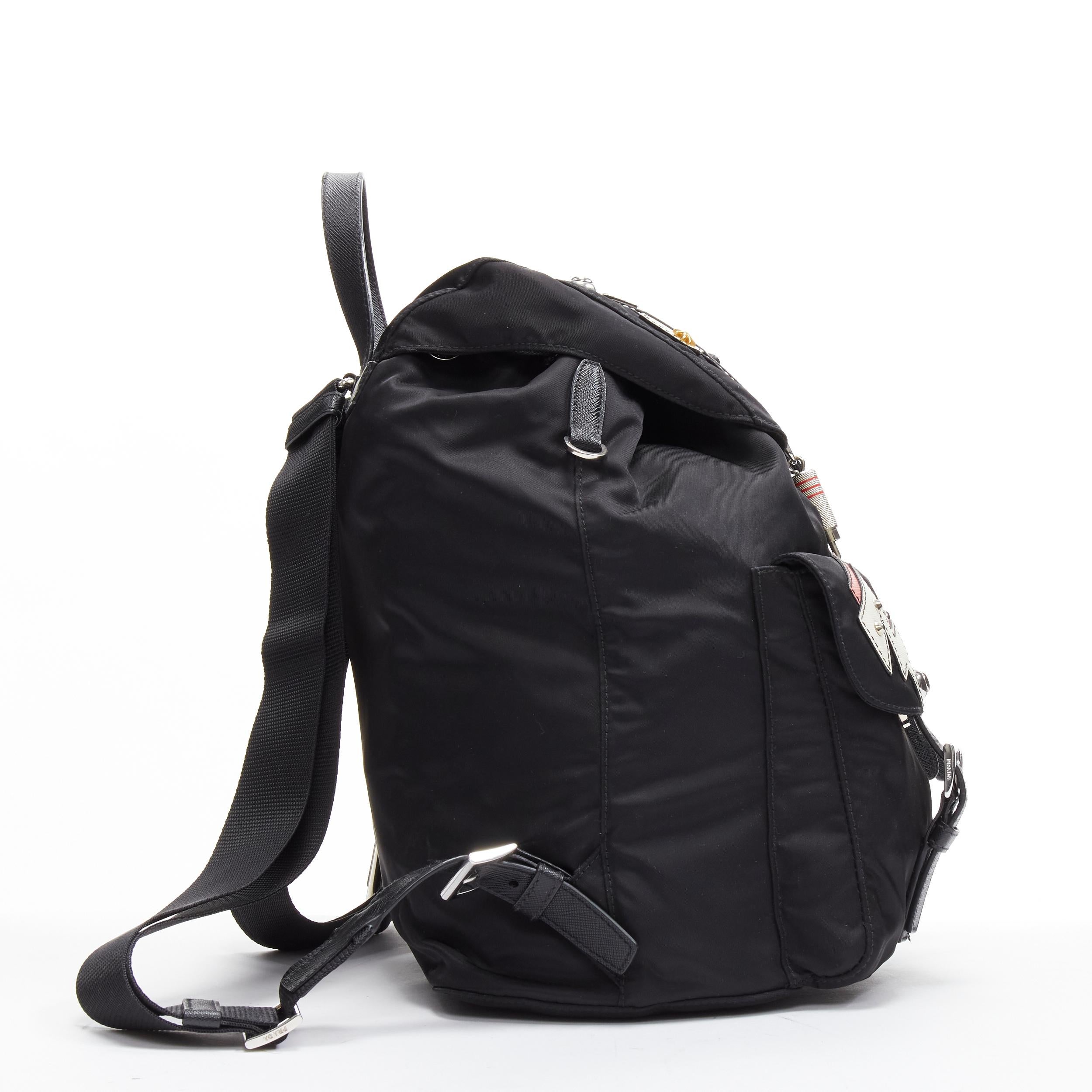 Black PRADA Tessuto Robot pink saffiano leather patchwork studded nylon backpack