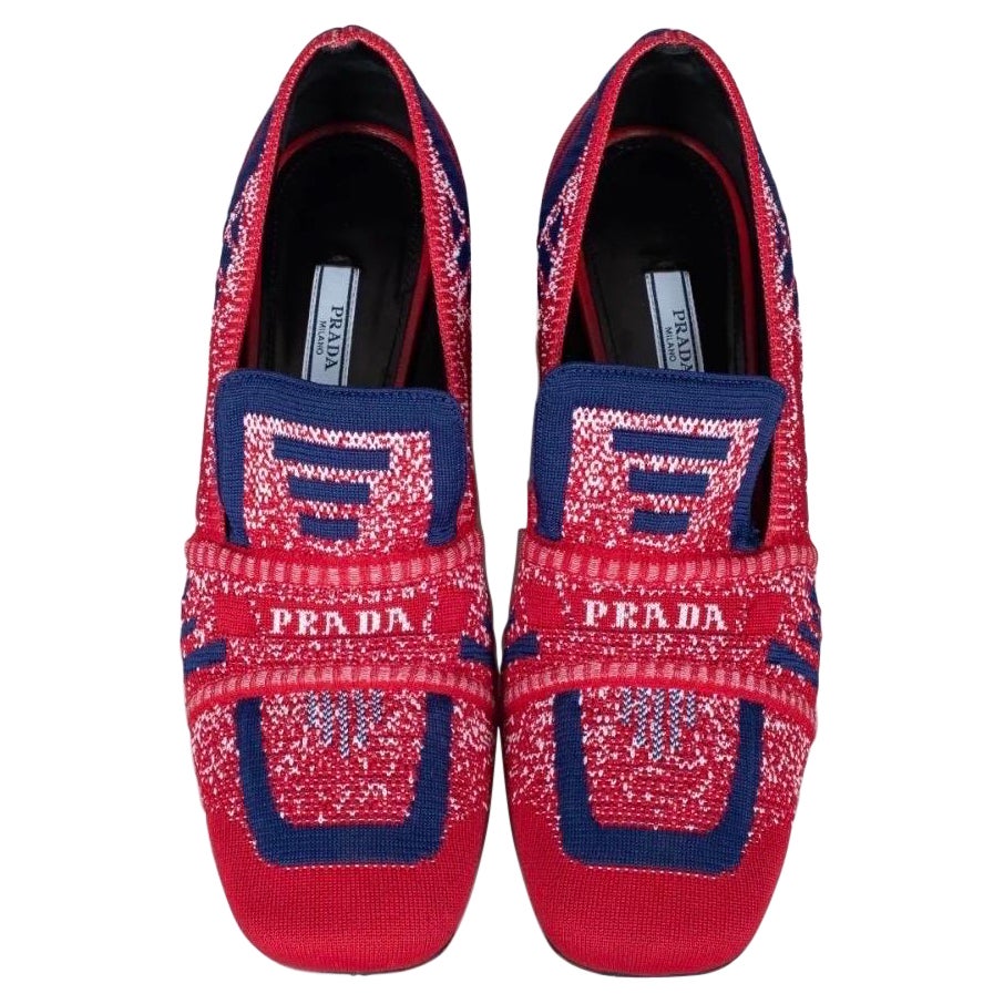 Step out in style with these elegant Prada heels! Crafted from textured fabric, these heels feature a sophisticated square-toe design and unique, sculpted heels. Perfect for adding a touch of luxury to any outfit. These are in very good