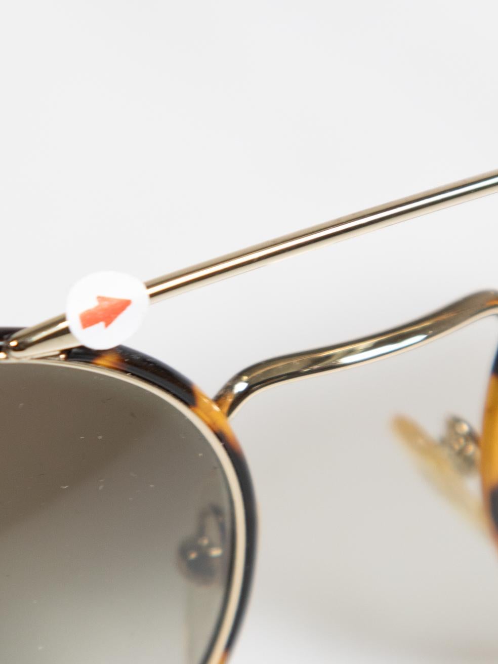 Prada Tortoise Pale Gold Round Sunglasses 1