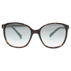 Occhiali da sole Prada in tartaruga e acetato verde acqua