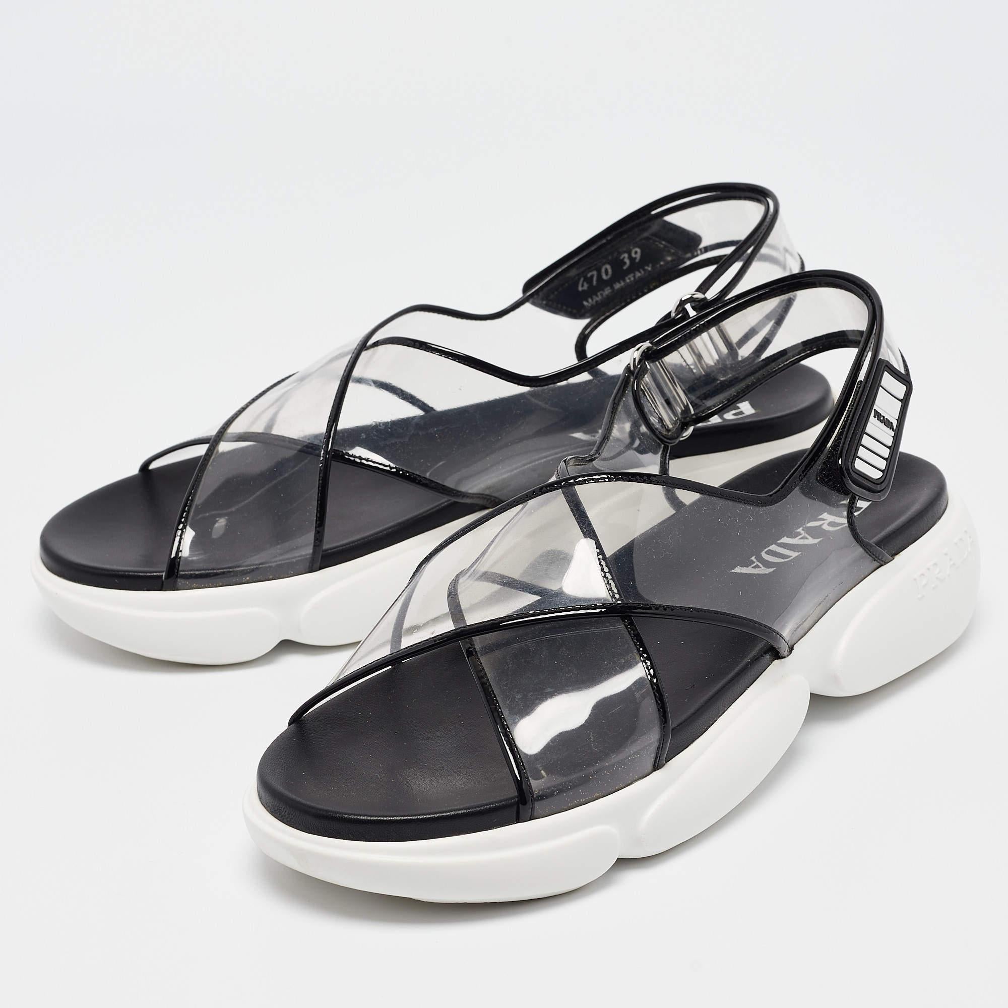 Keep it simple yet gorgeous in these sandals from the house of Prada. These Cloudbust shoes have been crafted in Italy and made from PVC. They carry cross straps. The sandals are finished with slingbacks and chunky soles.