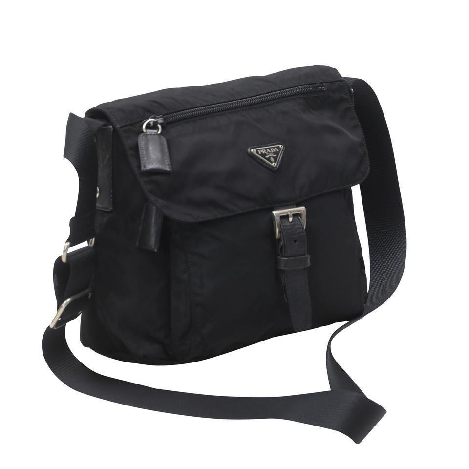 This Prada Black Nylon Medium Messenger Bag makes a perfect everyday bag and will hold all your daily essentials. It features durable nylon with Saffiano leather trim details and a long adjustable strap that can be worn on the shoulder or cross-body