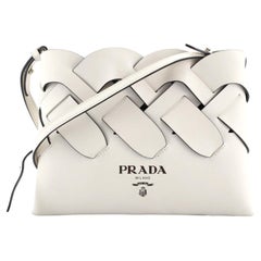 Prada Tress Clutch aus Leder Klein