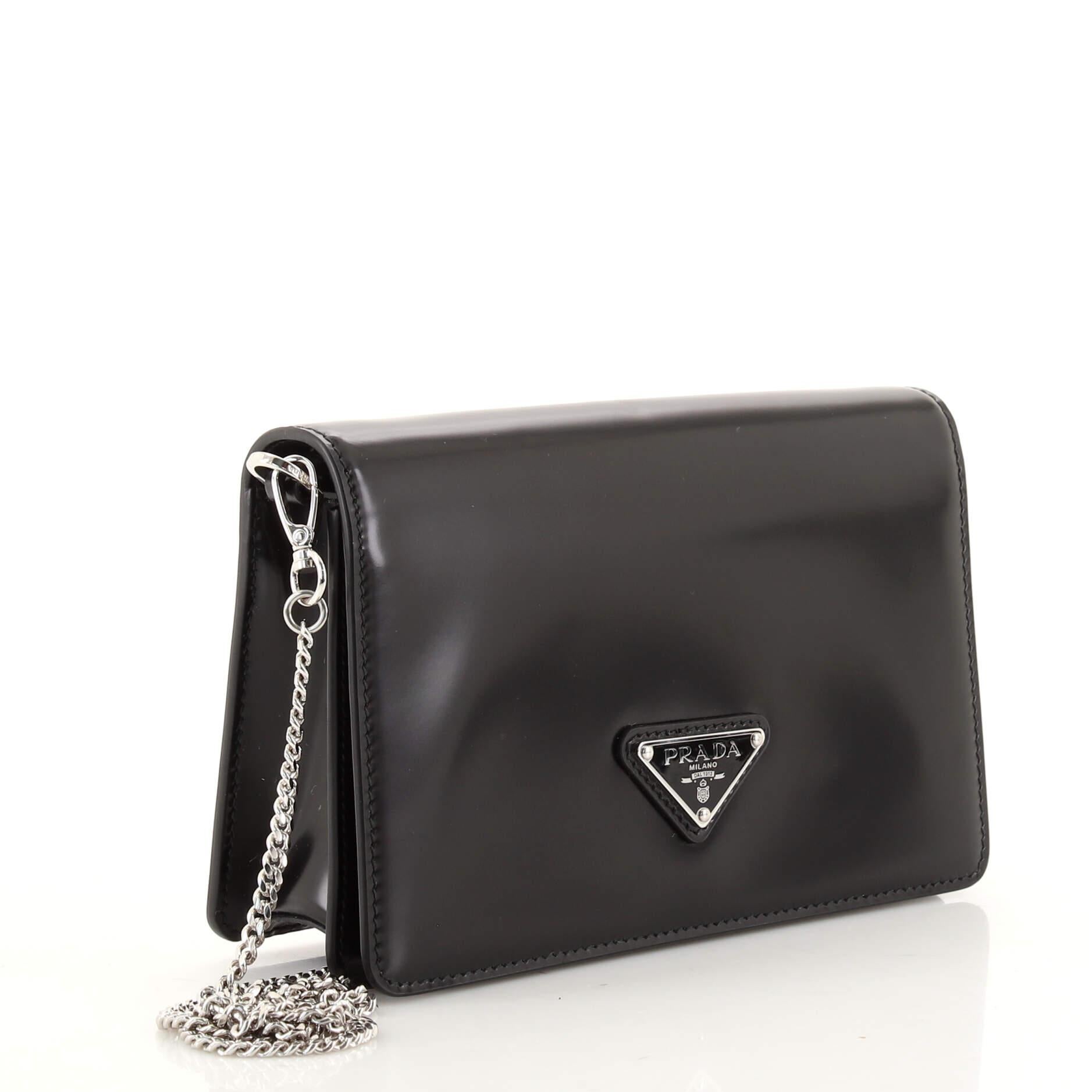 prada triangle logo flap leather crossbody bag