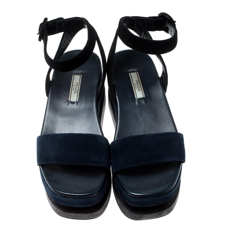 These Prada sandals have been expertly crafted in suede and finished with snug leather-lined insoles. The unique and eye-catching dual-platform offers a superior level of cushioning while the ankle strap ensures a perfect fit. Pair these with casual