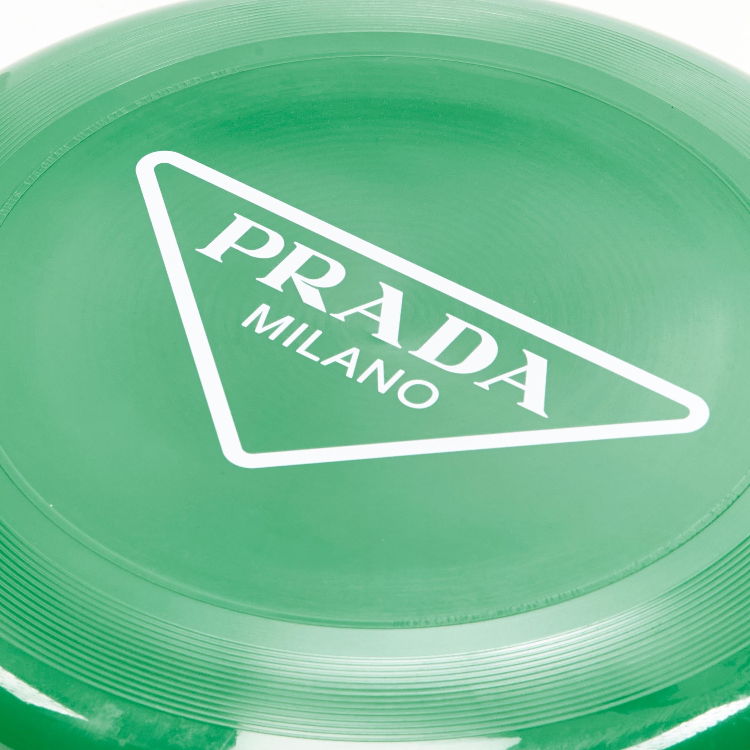 PRADA Tropico 2022 Limited Edition Collectible white logo print beach frisbee 
Reference: JOMK/A00078 
Brand: Prada 
Designer: Miuccia Prada 
Material: Plastic 
Color: Green 
Pattern: Solid 

CONDITION: 
Condition: New without tags. 

MEASUREMENTS: