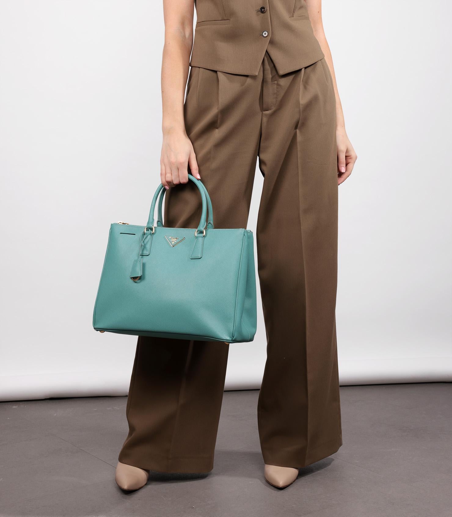 Prada Turchese Saffiano Lux Leather Special Order Large Galleria Tote

Product Details
Xupes Ref: CB1300
Brand: Prada
Model: Large Galleria Tote
Type: Tote
Serial Number: 7
Age: 2013
RRP: £4,500
Accompanied By: Prada Special Order Dust Bag,