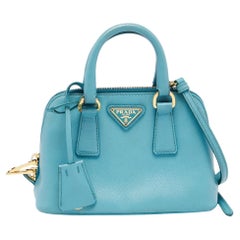 Prada - Sac à bandoulière Promenade en cuir turquoise Saffiano Lux