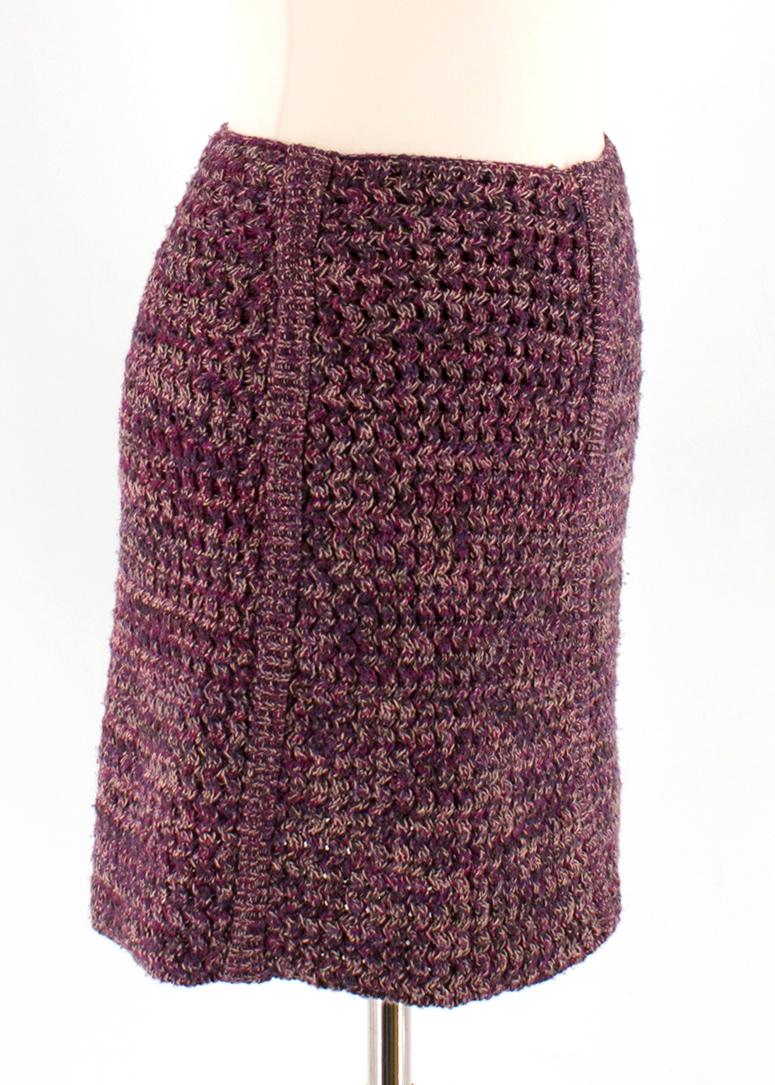 Prada Violet Wool Knit Mini Skirt

- violet wool knit skirt 
- mini length 
- inlined
- zip closure to the back

Please note, these items are pre-owned and may show some signs of storage, even when unworn and unused. This is reflected within the