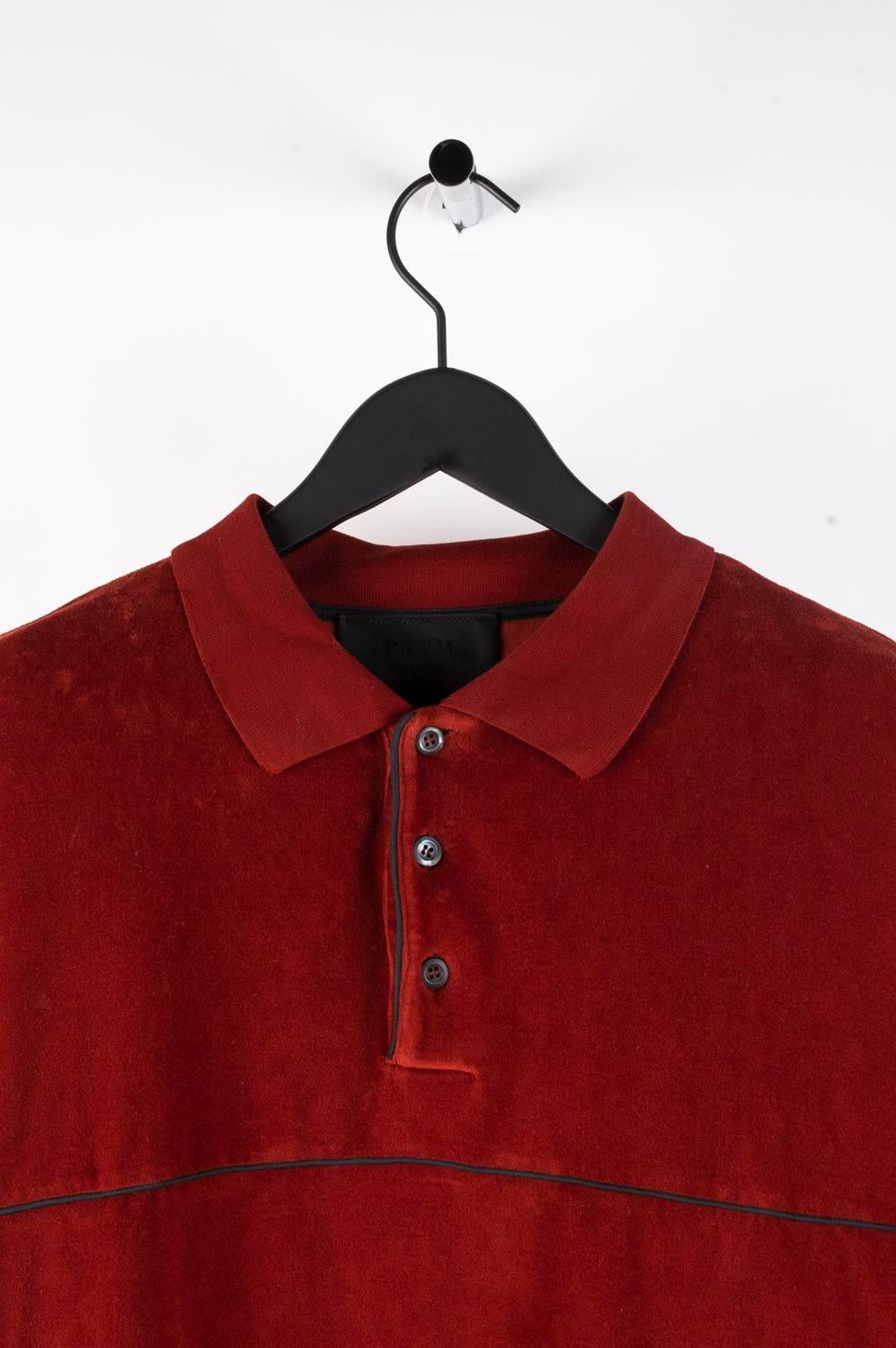 Item for sale is 100% genuine Prada Velour Men Jumper, S492
Color: Pale red
(An actual color may a bit vary due to individual computer screen interpretation)
Material: 100% cotton
Tag size: XL 
This jumper is great quality item. Rate 8.5 of 10, very